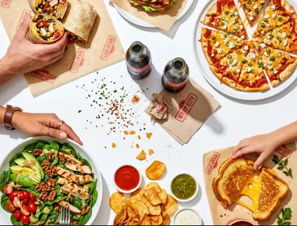 A spread of Wrap City food shared across a table